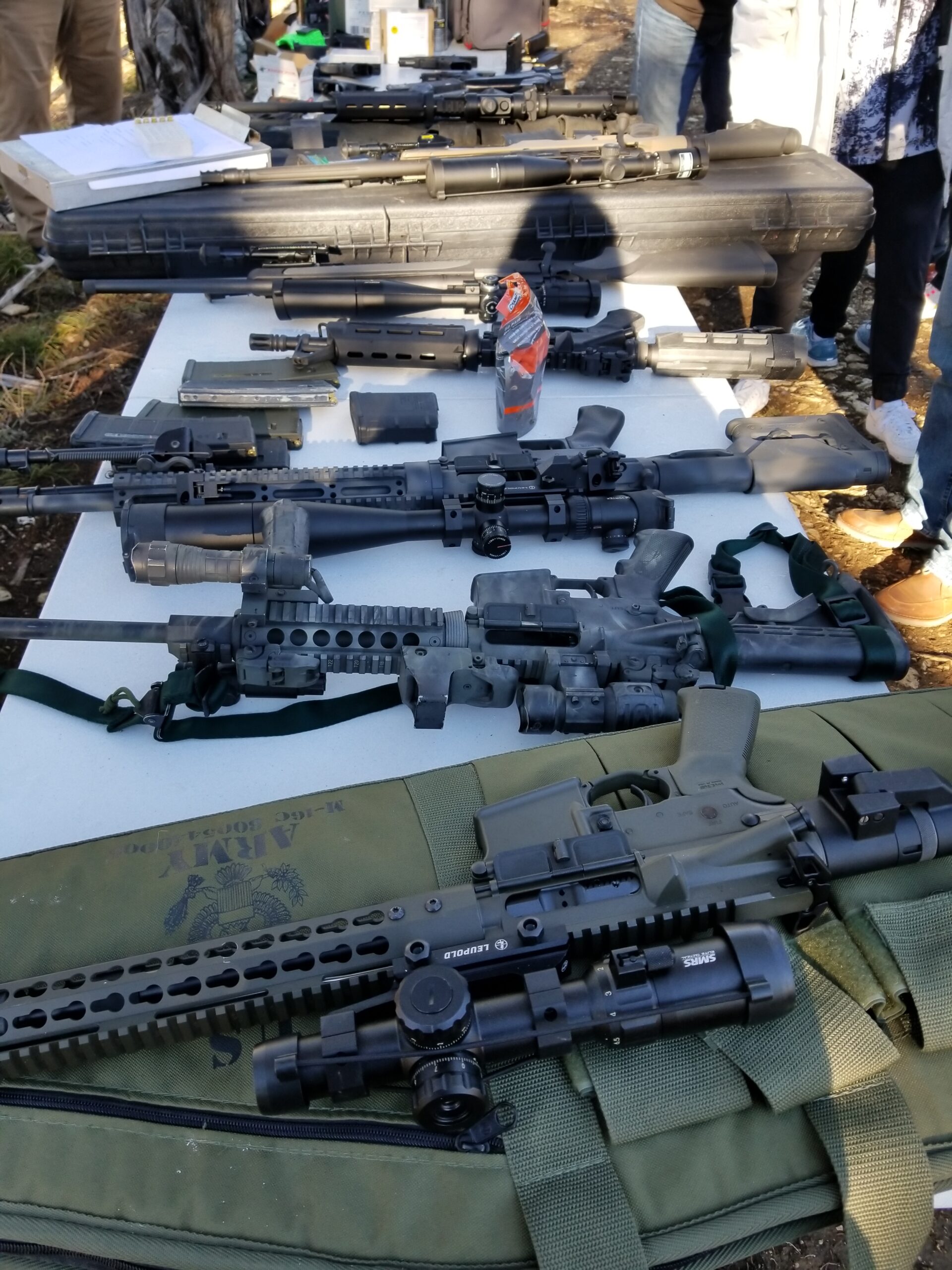 Instructor-led firearms training on an outdoor range